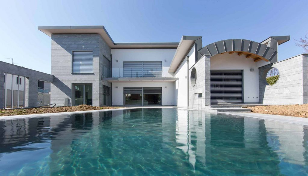 Image cover of Villa Milano with the main facade and the swimming pool